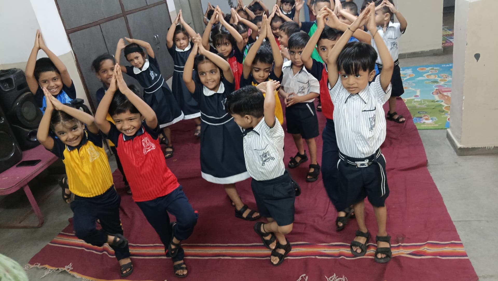 Students performing on stage during the school's Annual Day celebration